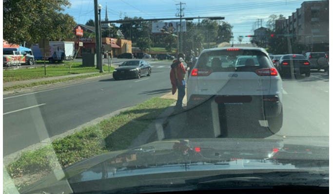 Nigerian man in disbelief as he spots kids hawking in traffic in US