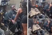 Video of barbershop where female barber kisses customers