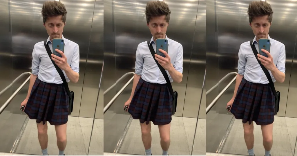 Male employee wears short skirt to work after men were banned from wearing shorts despite the summer heat