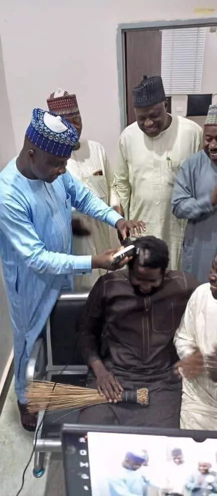 Man cuts his hair 7 years after vowing never to shave until Buhari resigns