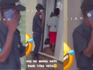 “Sure Say My Money Safe Like This?” – Customer Expresses Worry As Bank Security Guard Is Spotted Using iPhone 14 Pro Max (Video)