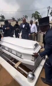 Gospel singer, Sammie Okposo Buried Amidst Tears, Wife Cries Uncontrollably (Videos)