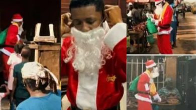 Heart-warming moment Small Doctor disguises as Father Christmas, storms Lagos market to gift people money