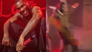 “God abeg” - Reactions as Burna Boy ‘kicks’ fan who tried to climb the stage at his Lagos show