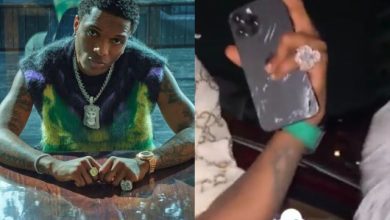 Wizkid stingy o! reaction as twitter users mocks Wizkid for using cracked iPhone